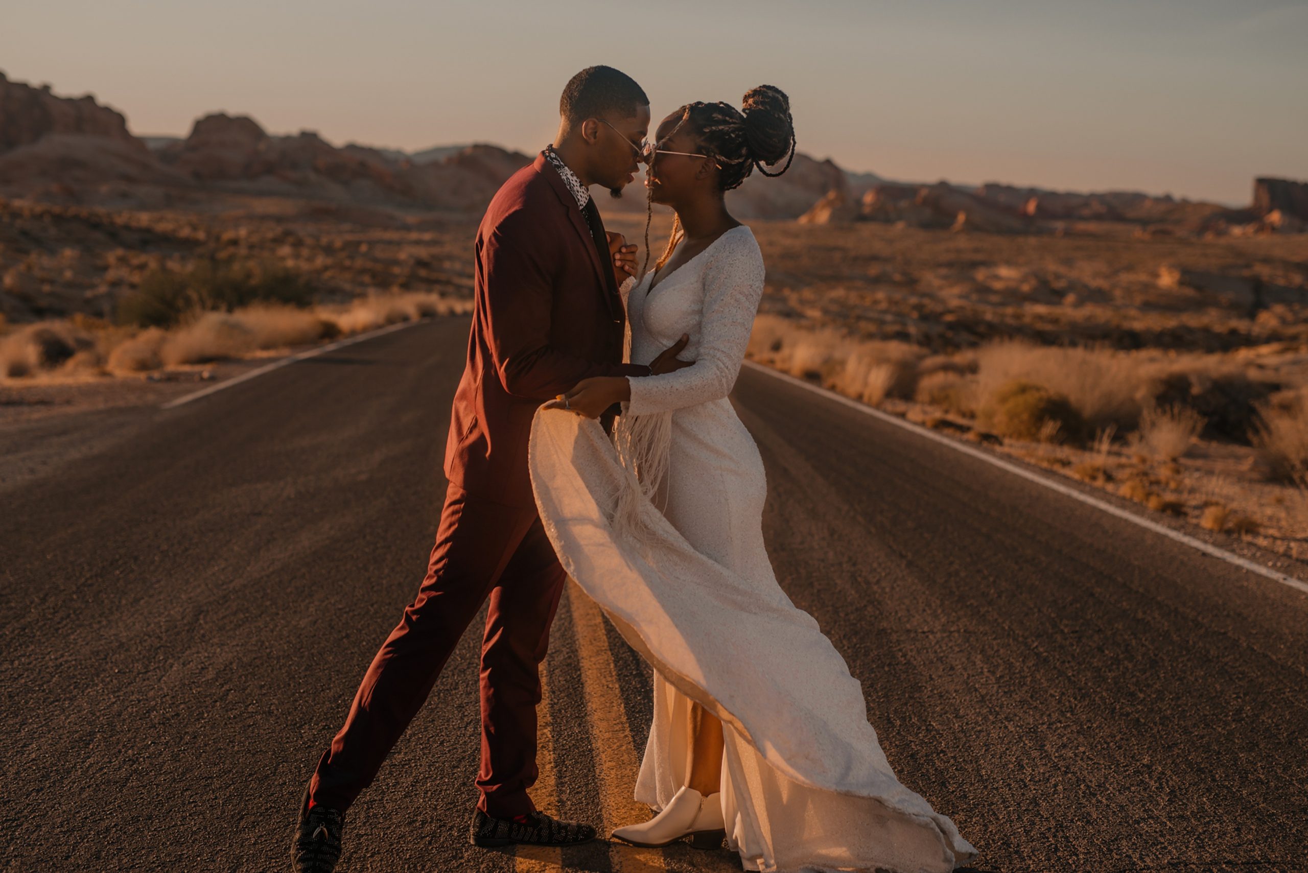 bride wearing Sequin boho wedding dress in the valley of fire by Shikoba Bride image by Marissa Rose Photography