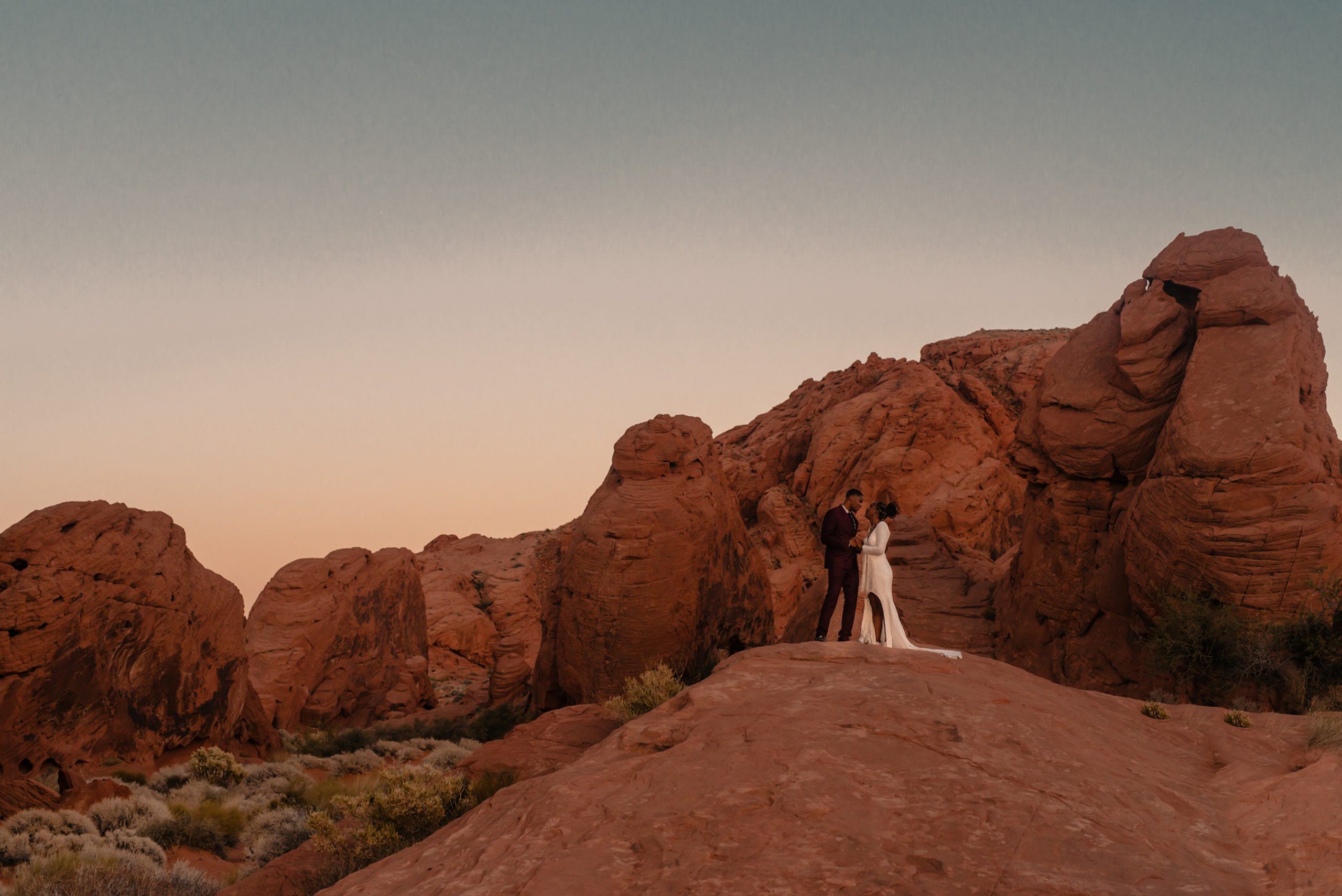 joni by shikoba bride wearing Sequin boho wedding dress in the valley of fire by Shikoba Bride image by Marissa Rose Photography